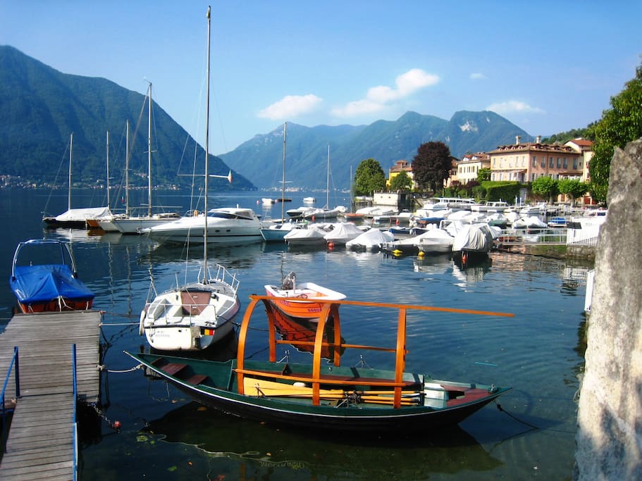 Lake-front scene with iconic local rowing boat 'the Luicia'