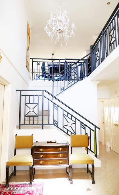 The stairs leading up to your room