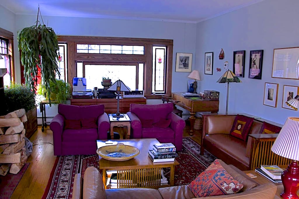 Spacious, inviting living room with classic Stickley furniture and fireplace... perfect for cozy family gatherings.