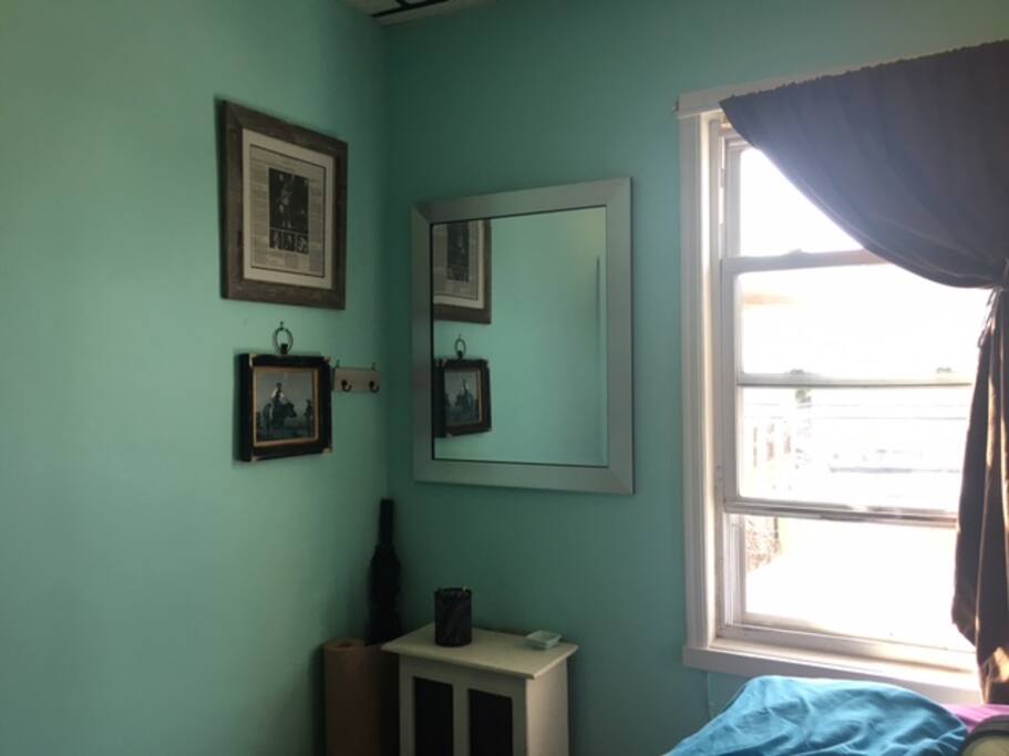 Large mirror. Blowdrier, yoga mat and umbrella provided.
