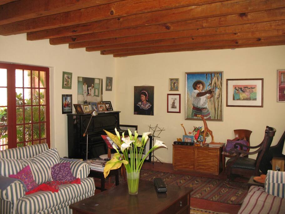 Downstairs large beamed lounge leading to terrace