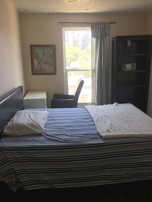 Queen bed, white drawers (can use as desk if you wish), storage shelf