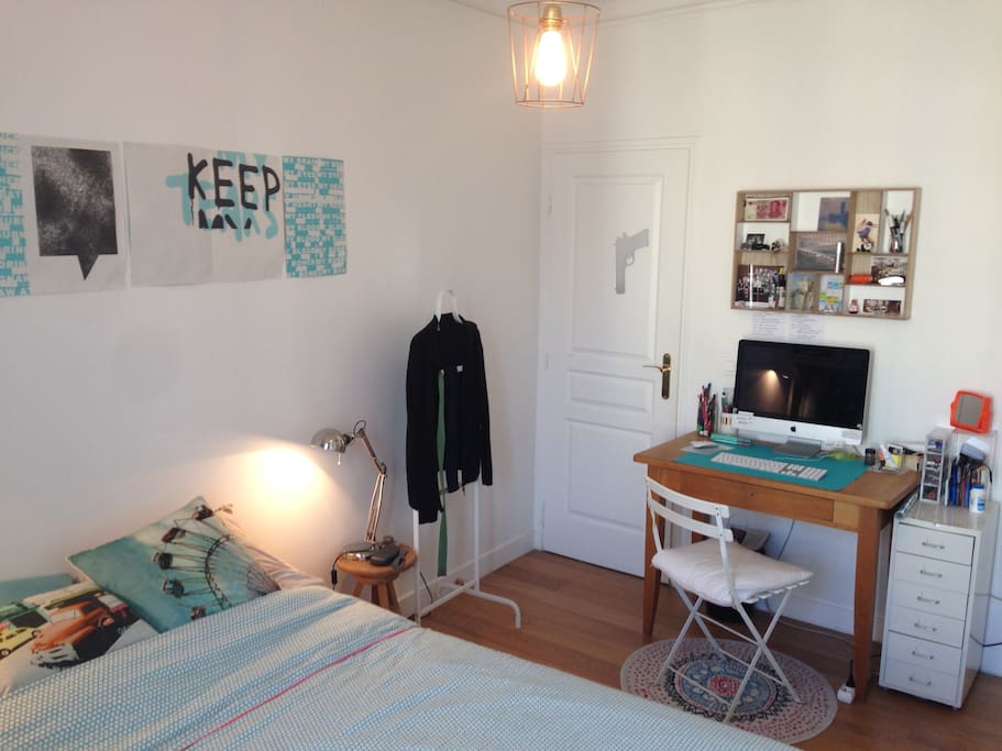 Bedroom with desk and a chair