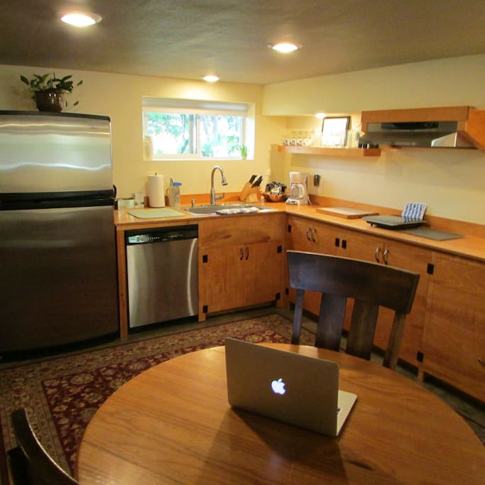 Spacious feeling kitchen, makes a great work space as well! Full size fridge with ice maker, oversized sink w/ disposal. Dishwasher of course.