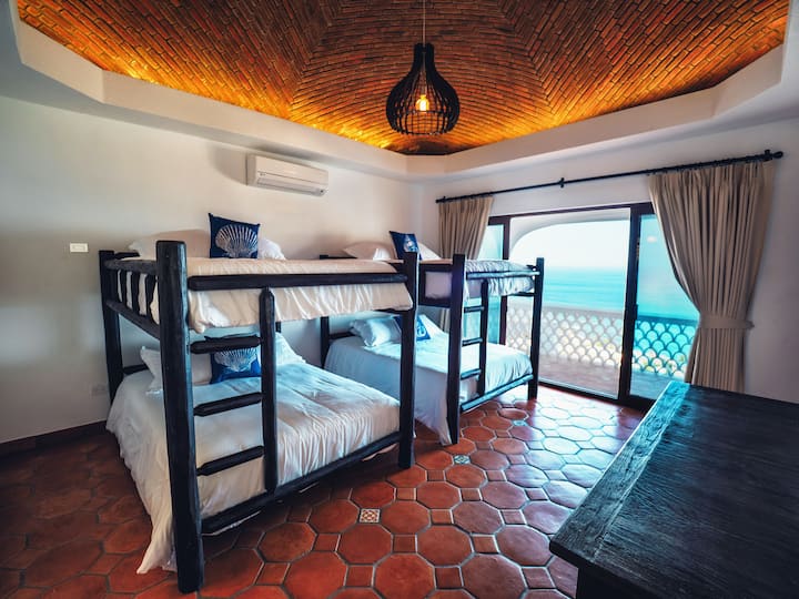 We offer a Bunk room with 4 full size beds suitable for either adults or kids, including it’s own private bathroom.