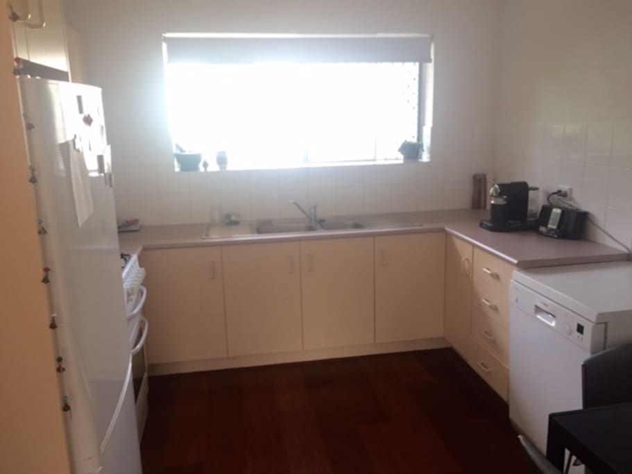 Large kitchen with gas stove, oven, large fridge, dishwasher & Nespresso Coffee Machine
