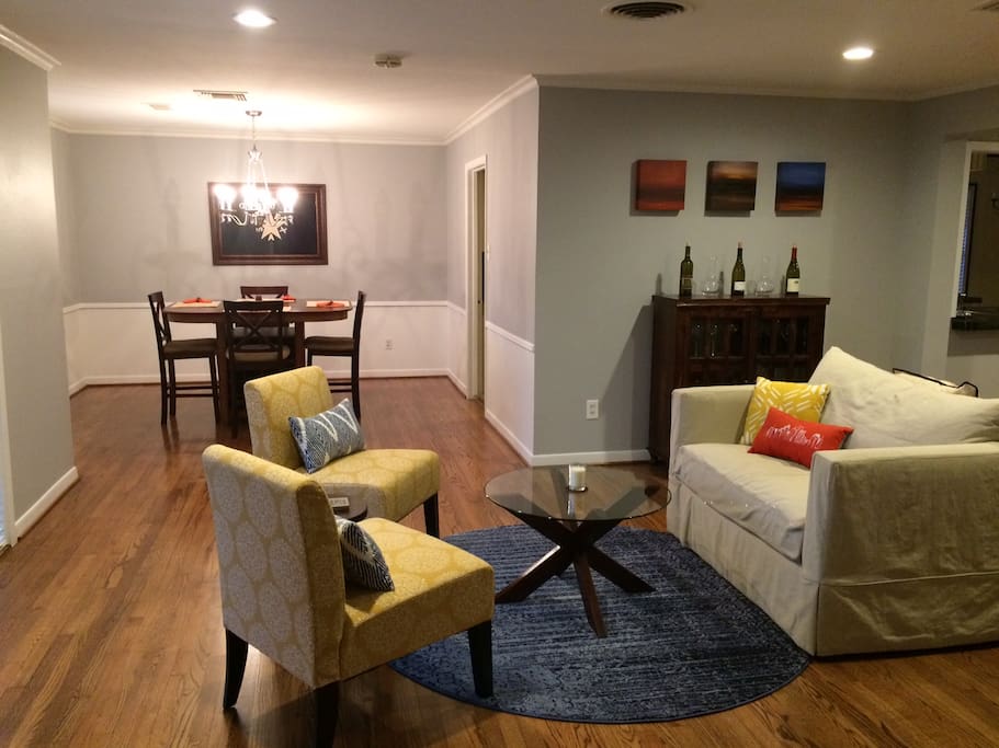 Just inside the entrance, a front sitting area. The sofa folds out to a single bed.