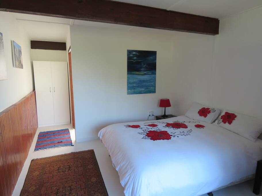 Main bedroom with en suite shower and toilet.