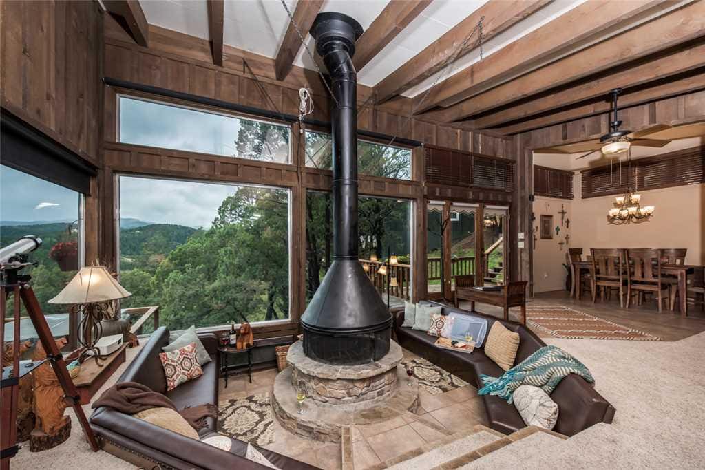 Spacious Living Room - >Property Name< has large comfortable couches, cable HDTV, and ceiling fan so you can enjoy your evenings