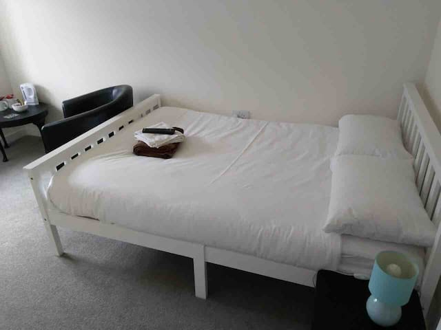 Double bedroom with bathroom and parking space