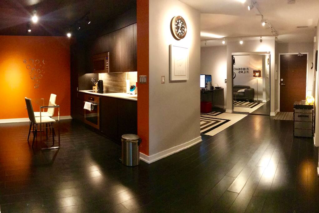 Brown door is main door. Left is kitchen/dining area.