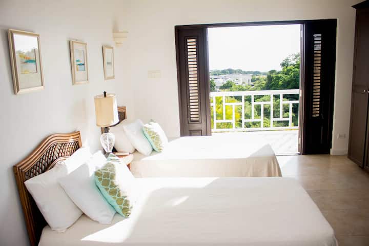 Spacious Queen bedroom ( the single beds were recently upgraded to a queen) 
With full ensuite bathroom, and a huge balcony overlooking the pool deck and Caribbean Sea