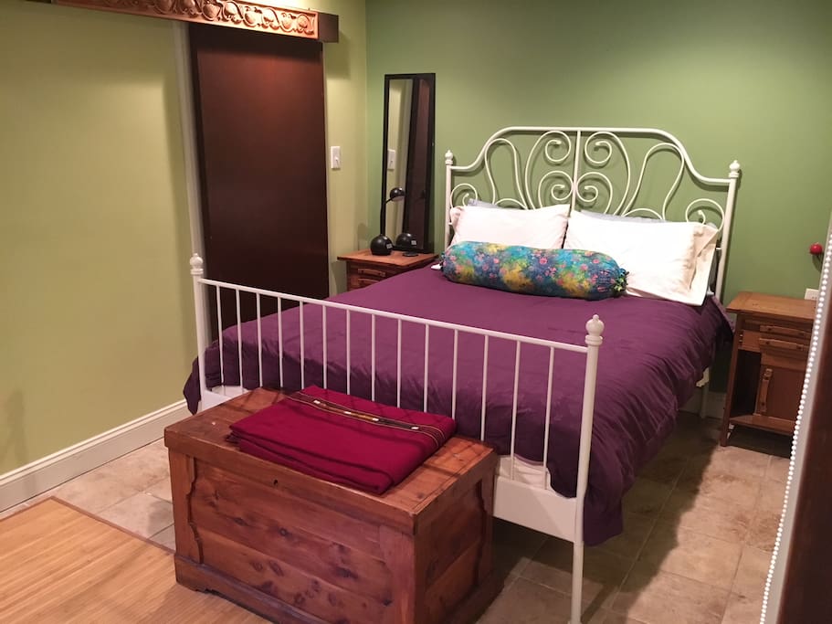 Master bedroom with comfy queen bed, big closet, attached bathroom and desk
