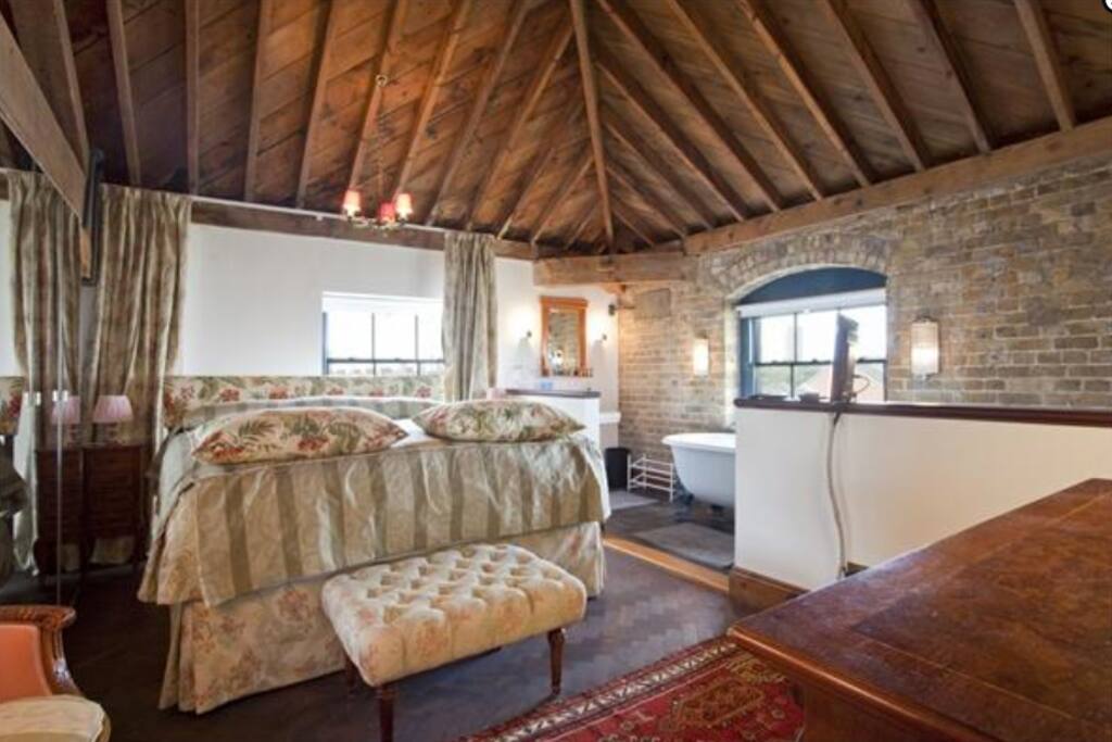 Sleep like the queen in our queen bed with views of the river