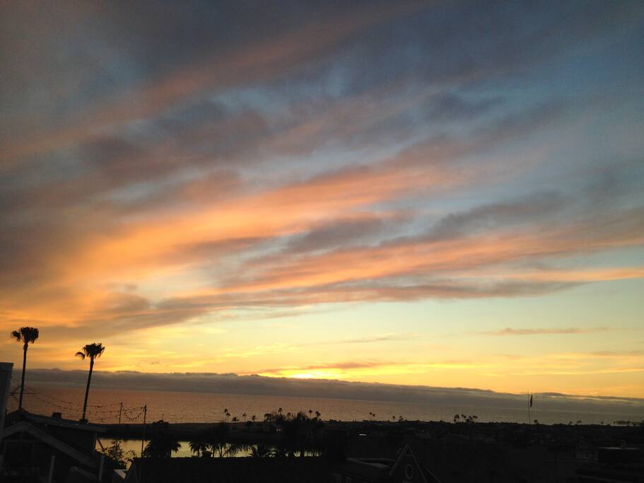 Rooftop sunset, a glass of wine... Does it get any better?