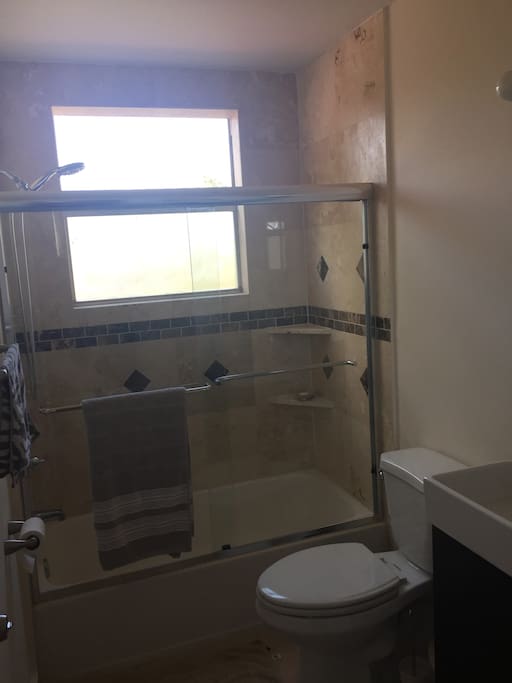Separate full bathroom with enclosed tub/shower for ultimate comfort. Careful with the Hot Water...we have so much, you may never leave the shower
