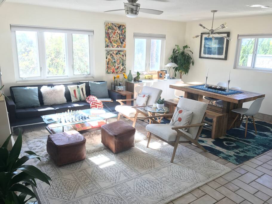 First floor living, dining, and kitchen with 1/2 bath