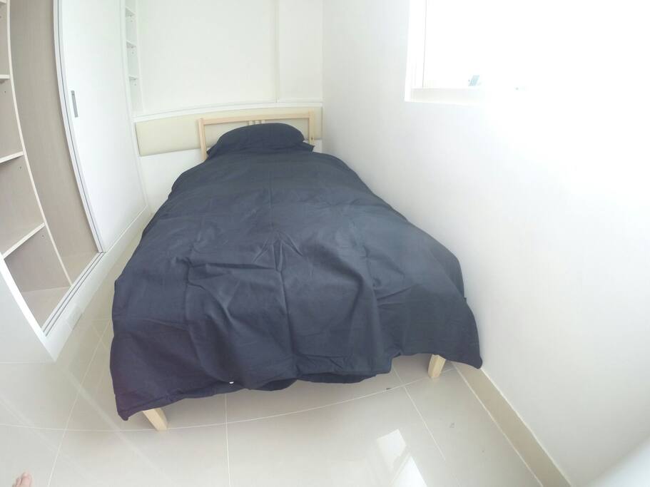 Single bed in bedroom