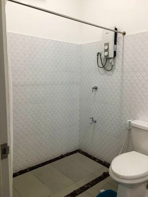 Master bathroom toilet and bath ( hot cold shower )
