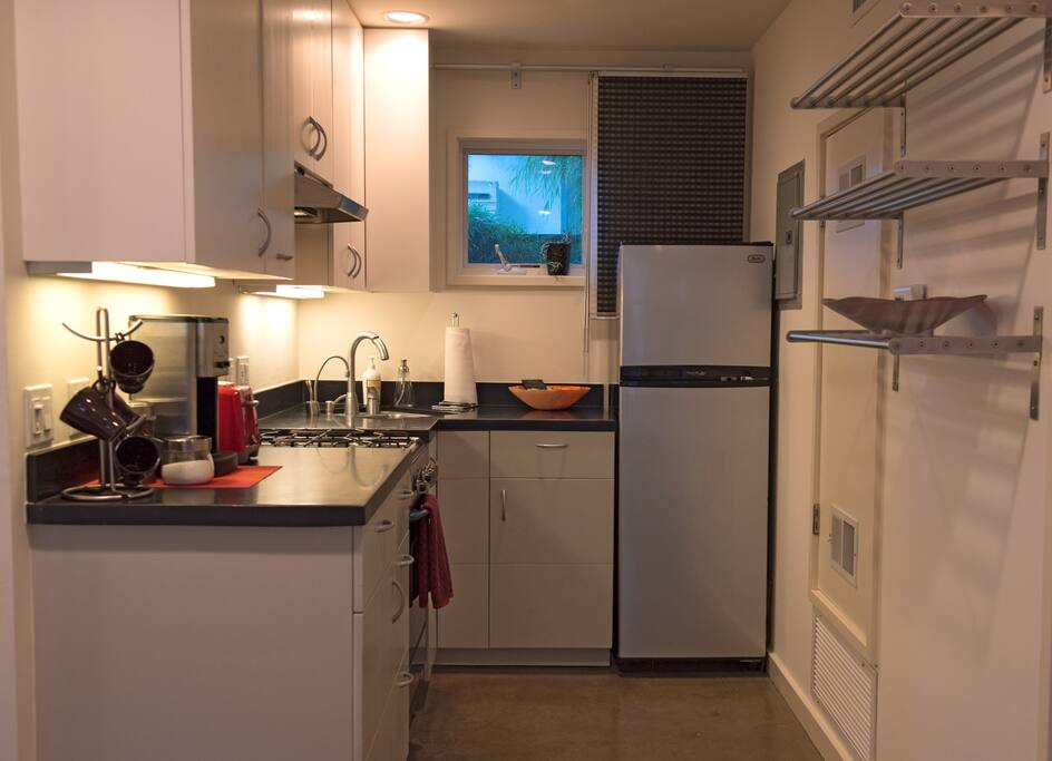 Refrigerator & freezer, gas range & oven, and garbage disposal.
