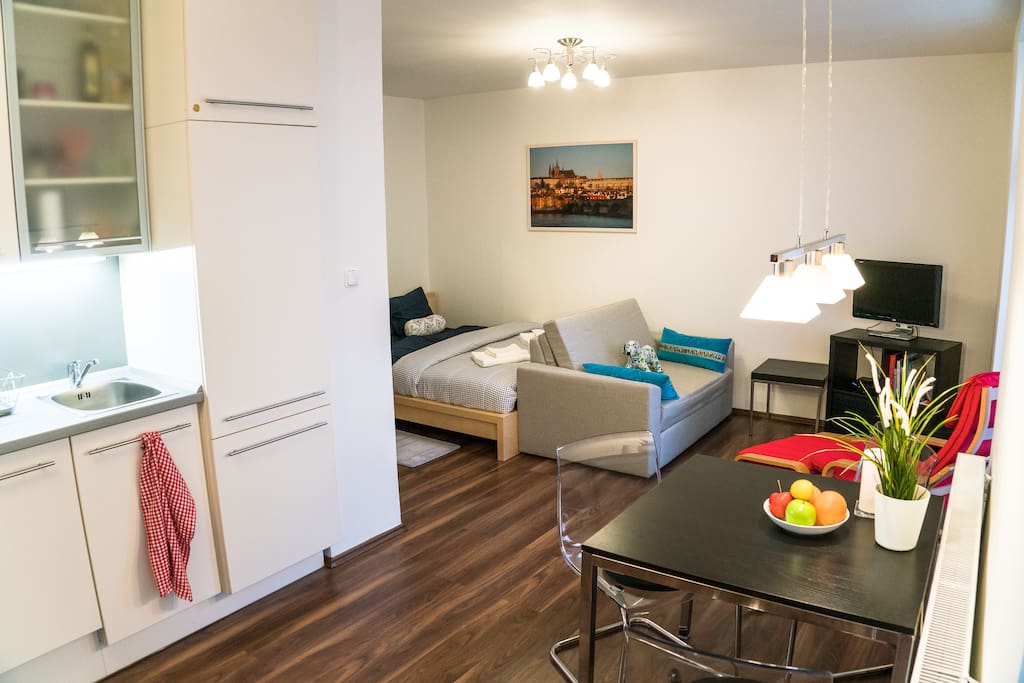 Living area with modern kitchen.