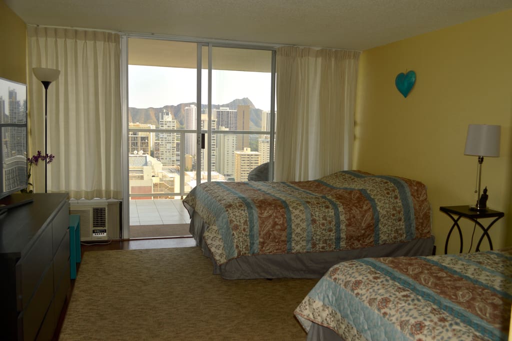 Bedroom with 2 queen beds and 55" TV with cable, HDMI ready and Netflix.