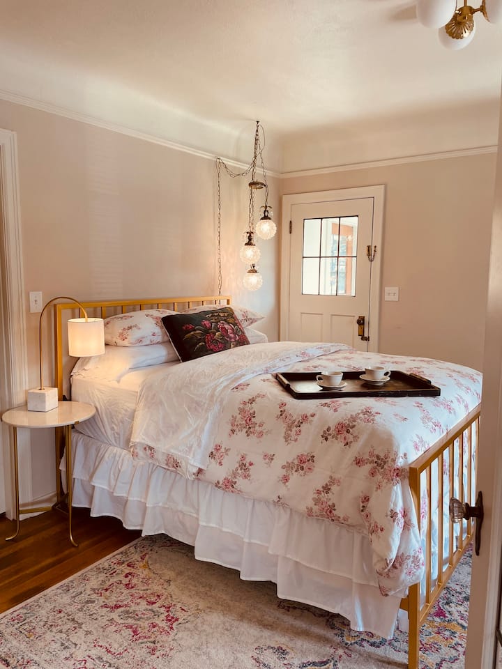 Bedroom & side porch.   Down bedding stuffed in Rachel Ashwell couture linen duvets.  Bedroom #1 no closet.