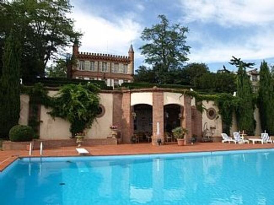 Outdoor pool with beautiful garden