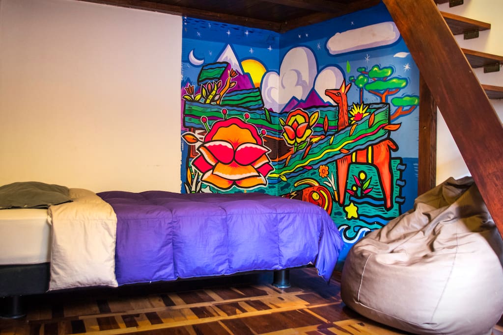 Single bed. View on graffiti
