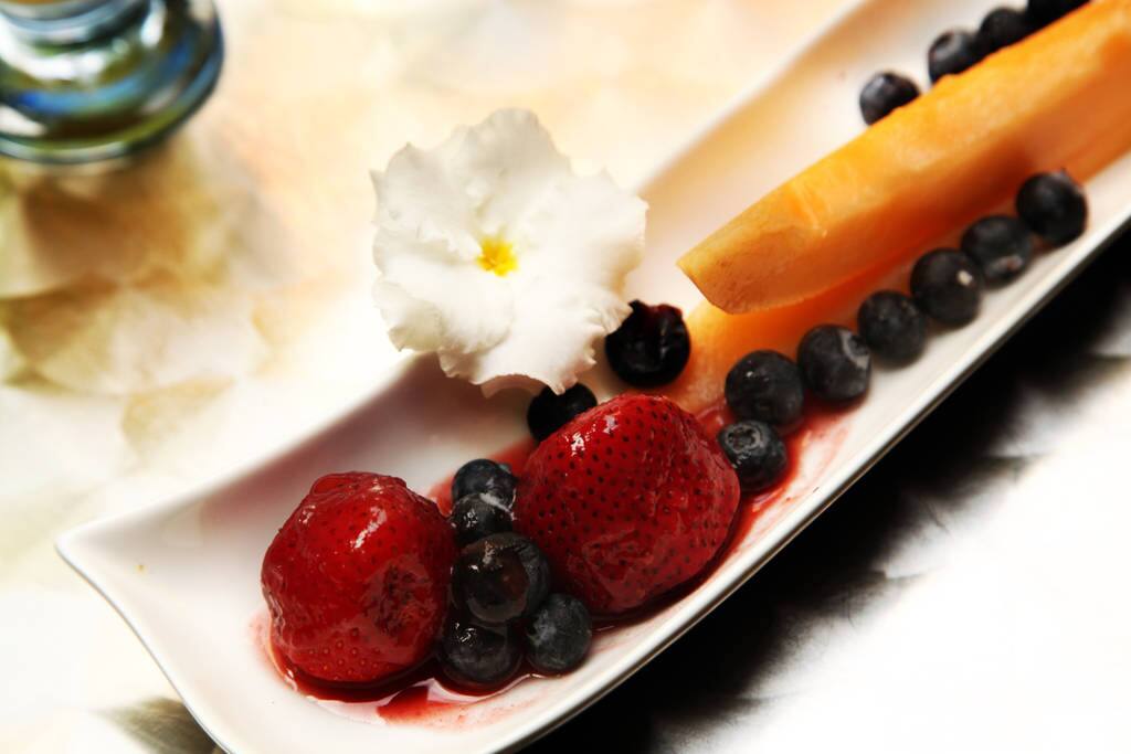 Gourmet 3 course breakfast prepared by chef Alex is served in lush interior garden right outside your door.