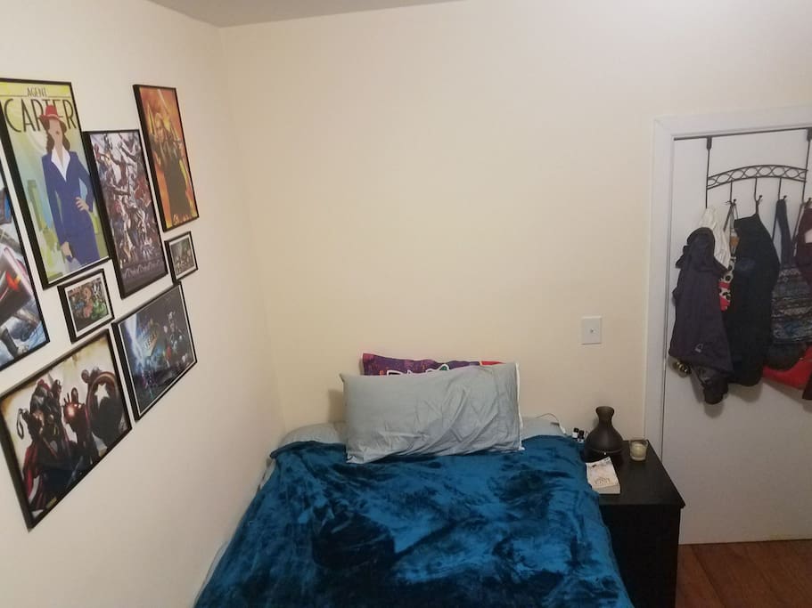 Full bed with duvet, sheets, and fuzzy blankets