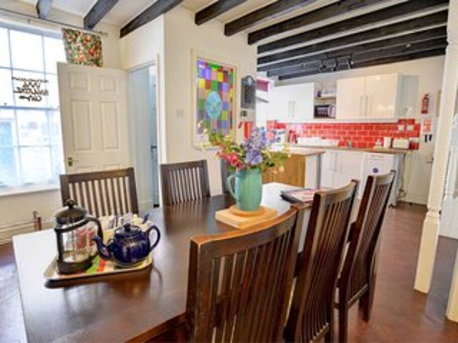Ground floor kitchen/dining room with table to seat 6 (open fire not in use)