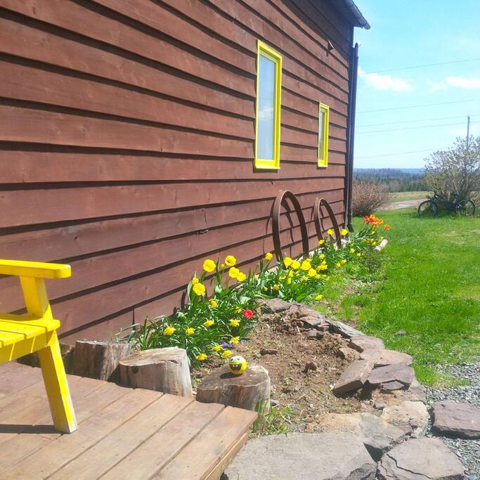 Sit on the porch and stop to smell the flowers.