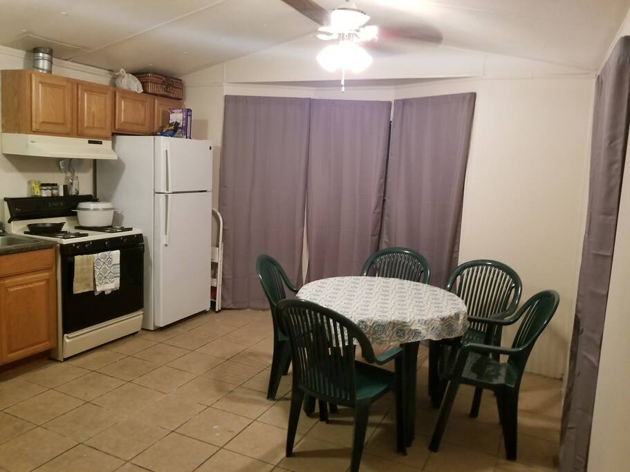 Kitchen View with stove and fridge