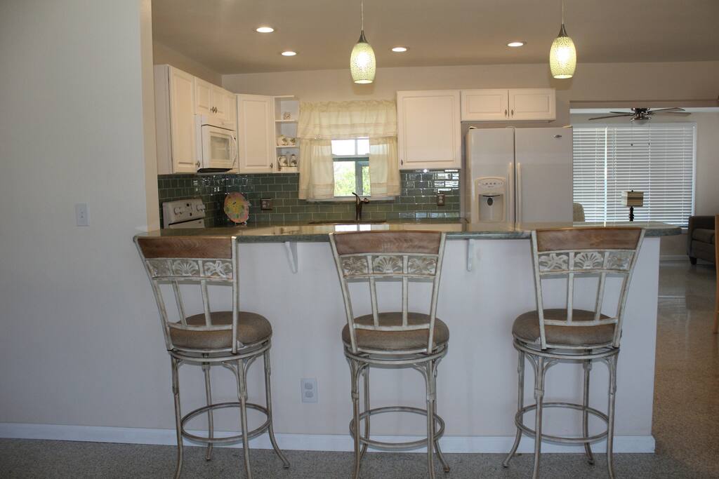 Bar stool dining convenient for a quick bite or watching the cook of the family!