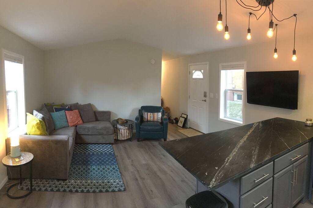 Living room with TV w/ Netflix, Youtube, and Antenna TV