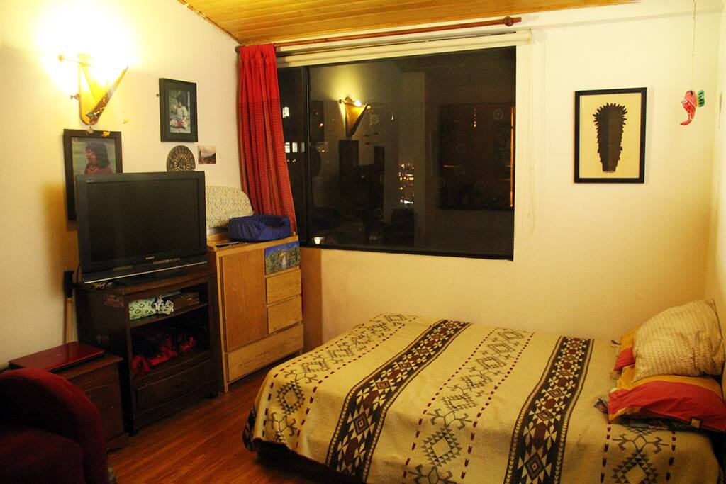 upstairs bedroom with beautiful city views