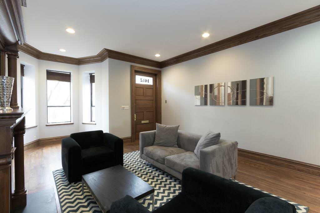 Gorgeous sunny open living space with front bay window