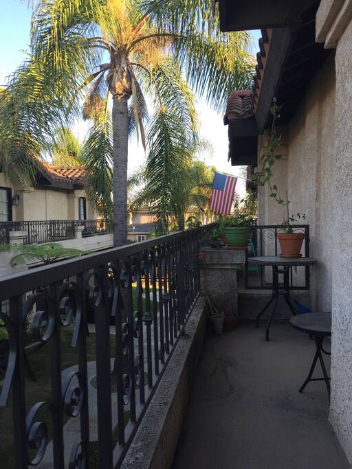 View of the upstairs balcony area, great for enjoying your morning coffee and relaxing.