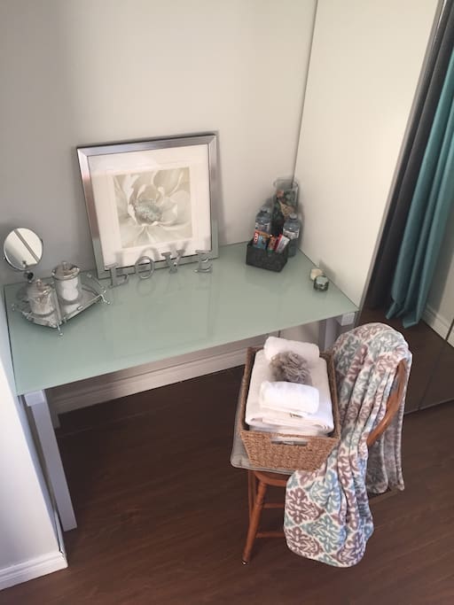 Private desk for working or getting ready.