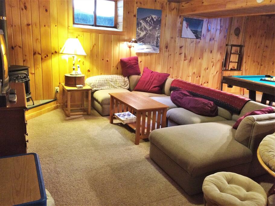 Lots of seating in basement rec room for entertaining/hanging out including Pool table and Foosball table