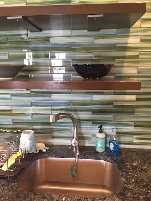 When the light catches this glass tile wall just right the lake is reflected like a mirror of bliss