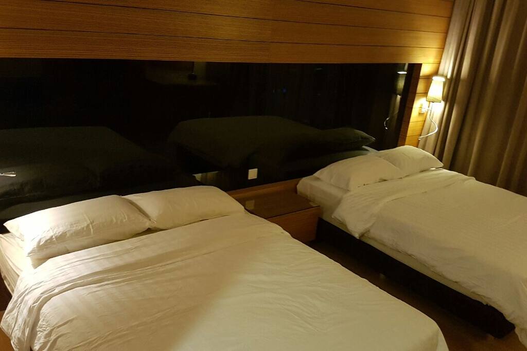 Bedroom 2 with two Queen Size beds & en-suite bathroom