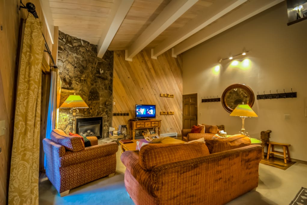 Spacious and Open Living Area, Kitchen and Dining Area With vaulted Ceilings, Balcony , Gas Fireplace and Flat Screen TV