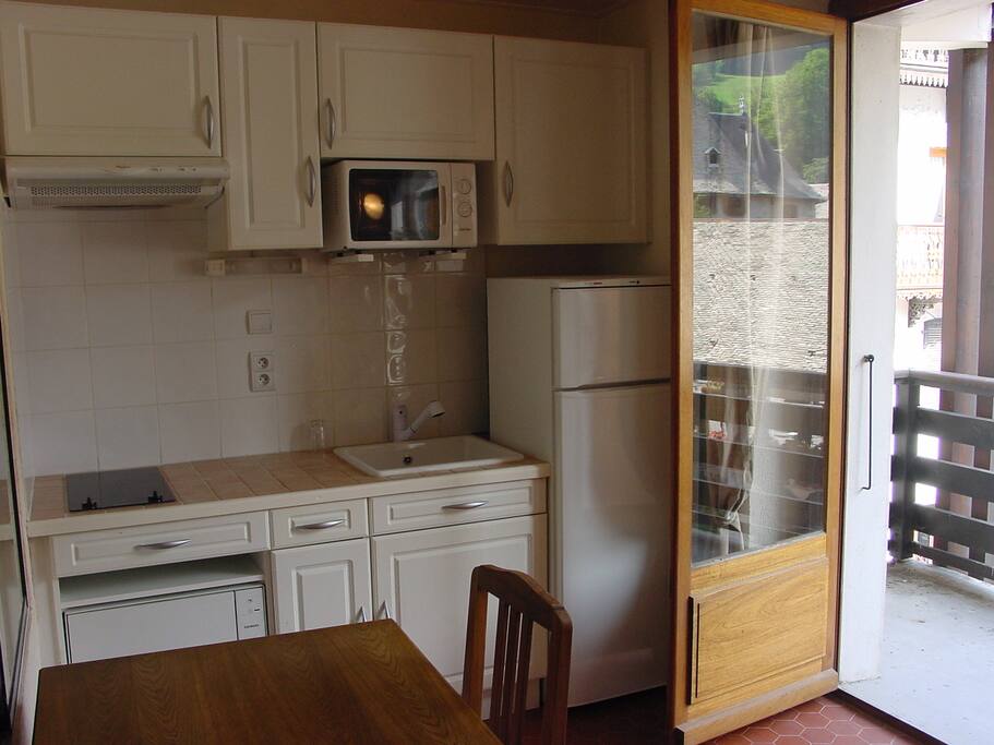 Coin cuisine et balcon