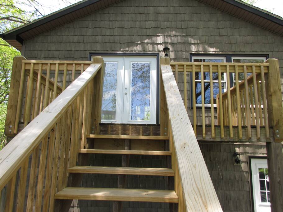 Walk-up entrance and deck to the guest area.
