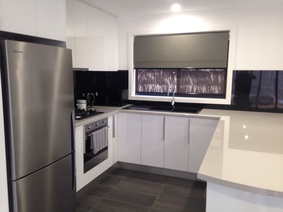 Modern entertainers kitchen with gas cooker