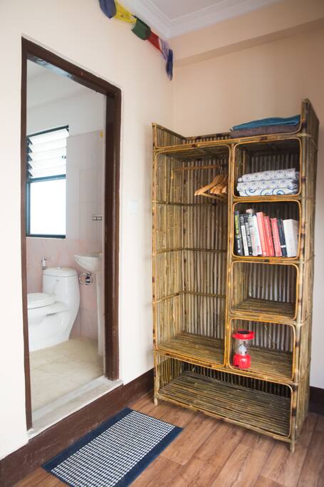 Your ensuite bathroom and rattan wardrobe made locally.