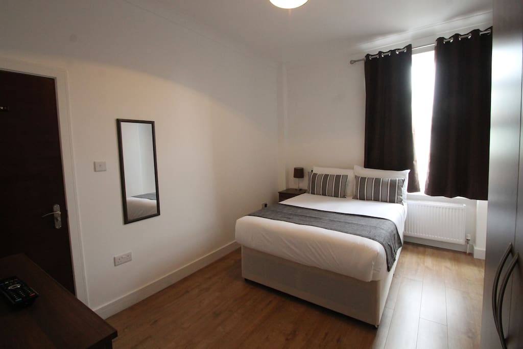 Spacious room with comfortable double bed