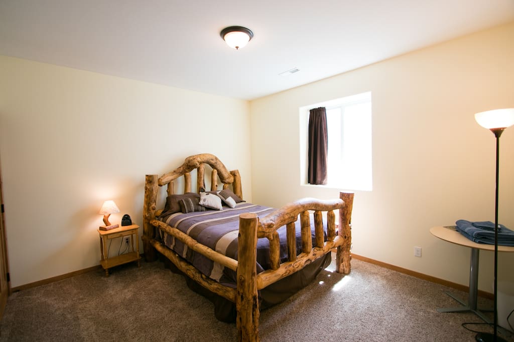 Queen-sized log bed